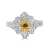 0.20ct Orange Diamond ring with 0.67tct diamond accents set in 14K two tone gold
