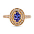 0.66ct Tanzanite Ring With 0.70tct Diamond Halo In 14K Yellow Gold